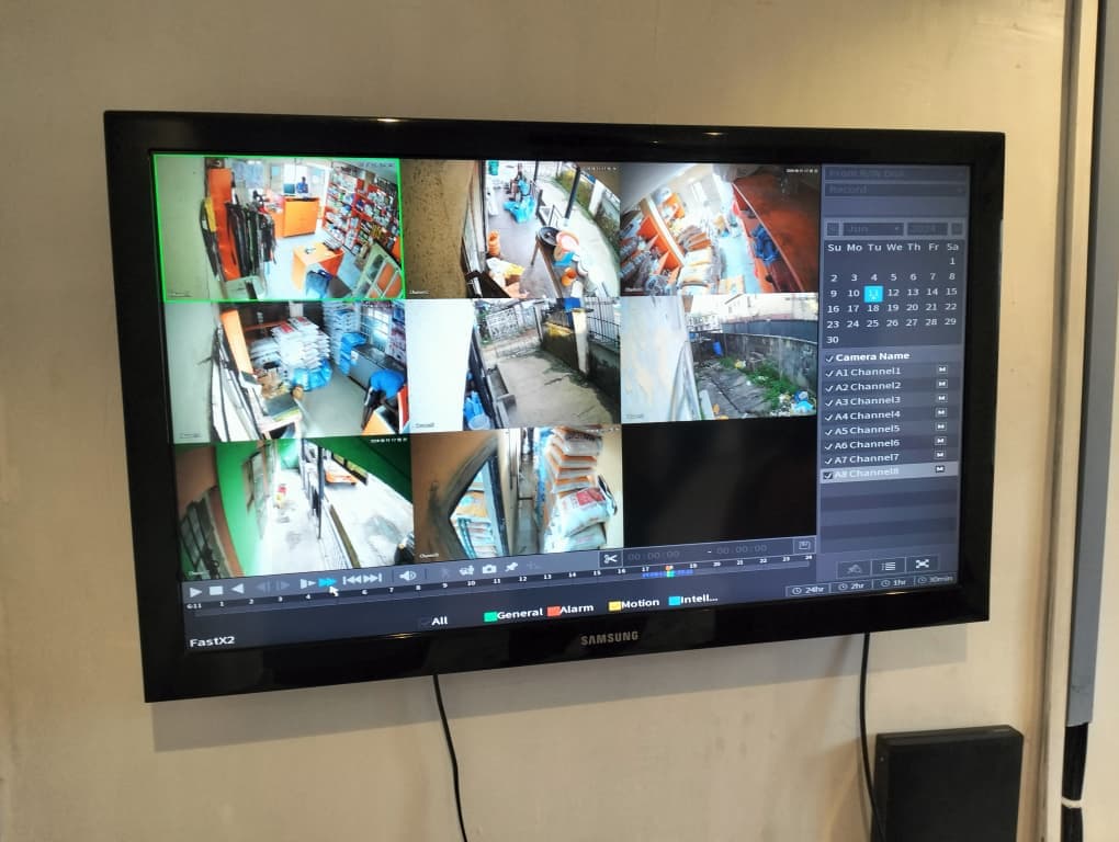 An eight-channel CCTV surveillance feed on a Primera-installed monitor